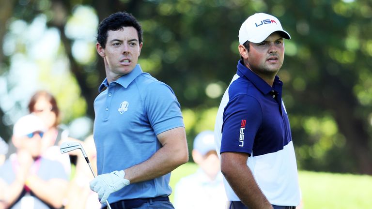 CHASKA, MN - OCTOBER 02:  Rory McIlroy of Europe and Patrick Reed of the United States look on from the fourth tee during singles matches of the 2016 Ryder