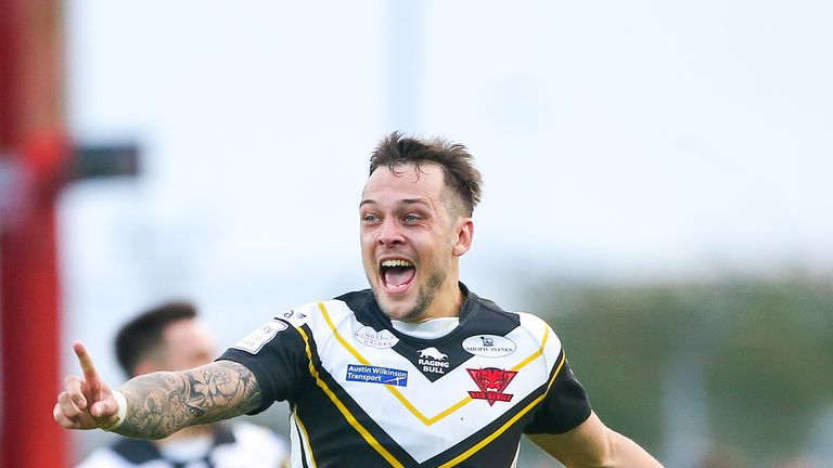 Gareth O'Brien celebrates scoring the golden-point drop-goal against Hull KR