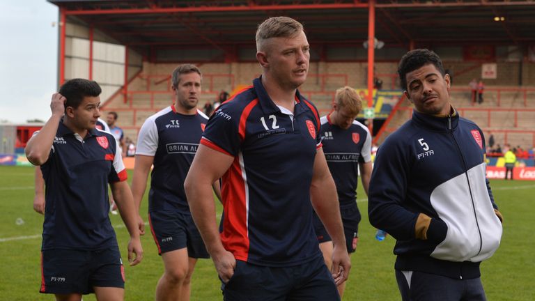 Hull Kingston Rovers' players and staff are dejected after losing the Million Pound Game