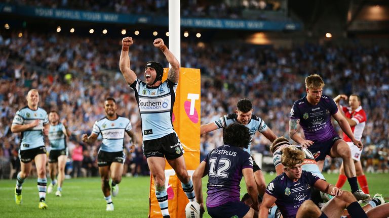 Michael Ennis  celebrates Andrew Fifita's try in the NRL Grand Final