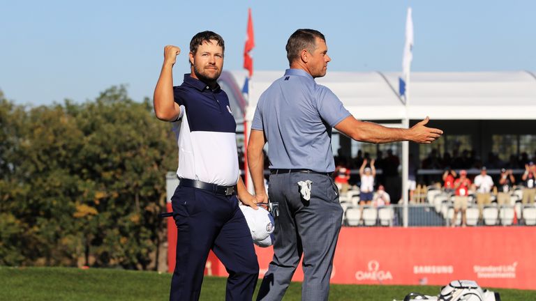 CHASKA, MN - OCTOBER 02: Ryan Moore of the United States celebrates on the 18th green after winning his match and the Ryder Cup against Lee Westwood of Eur