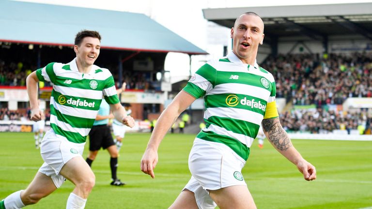 Kieran Tierney (left) celebrates with Celtic captain Scott Brown