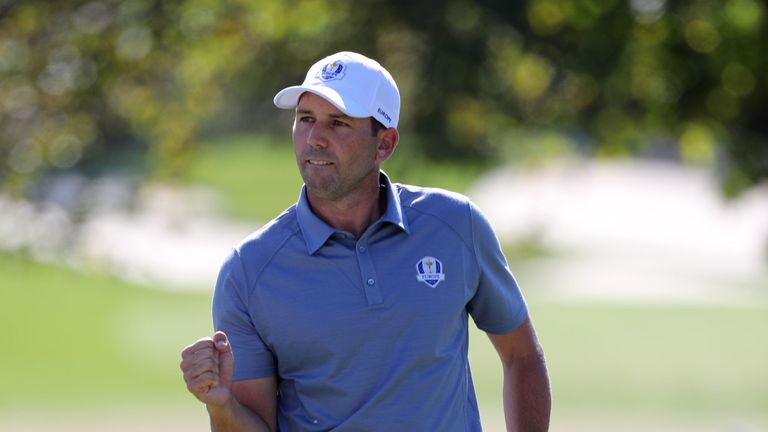 Europe's Sergio Garcia celebrates a putt during the singles match against Phil Mickelson