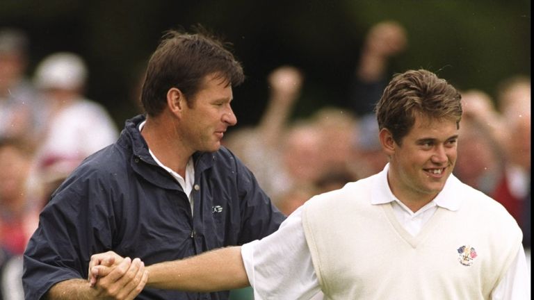 27 Sep 1997:  Lee Westwood and Nick Faldo of England celebrate during the Ryder Cup at the Valderrama Golf Club in Sotogrande, Spain. \ Mandatory Credit: R