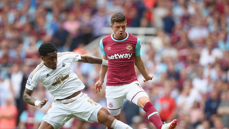 LONDON, ENGLAND - MAY 07:  Leroy Fer of Swansea City tackles Aaron Cresswell of West Ham United during the Barclays Premier League match between West Ham U