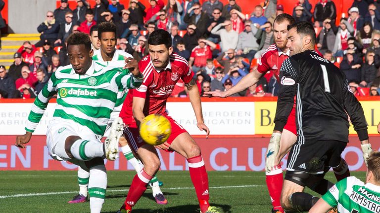 Aberdeen's Joe Lewis saves an attempt on goal from Celtic's Moussa Dembele 