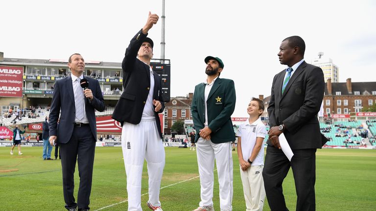 England captain Alastair Cook tosses the coin alongside Pakistan captain Misbah-ul-Haq