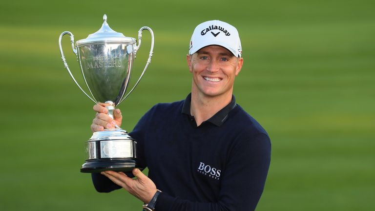 WATFORD, ENGLAND - OCTOBER 16:  Alex Noren of Sweden poses with the trophy following his victory during the fourth round of the British Masters at The Grov