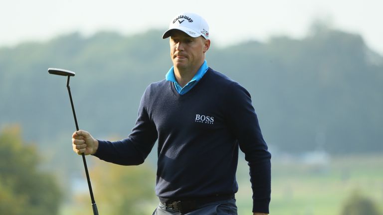 WATFORD, ENGLAND - OCTOBER 14:  Alex Noren of Sweden celebrates a birdie on the 13th hole during the second round of the British Masters at The Grove on Oc