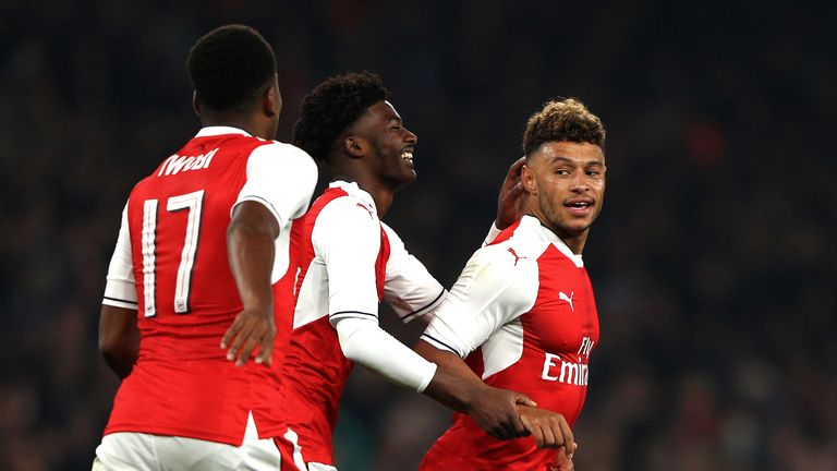 Alex Oxlade-Chamberlain celebrates scoring Arsenal's second goal with his team-mates