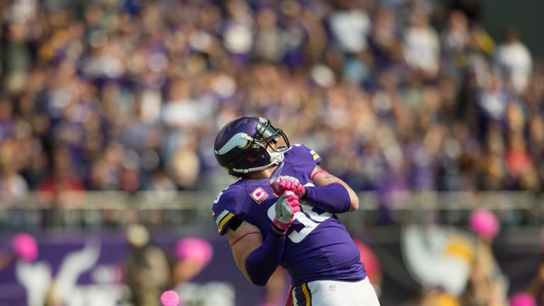Brian Robison #96 of the Minnesota Vikings celebrates after sacking quarterback Brock Osweiler #17 of the Houston Texans