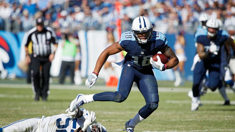 NASHVILLE, TN - OCTOBER 23: Rishard Matthews #18 of the Tennessee Titans breaks a tackle against D'Qwell Jackson #52 of the Indianapolis Colts in the fourt