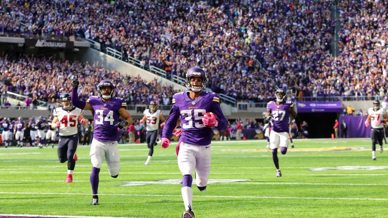 Marcus Sherels #35 of the Minnesota Vikings returns a punt 79 yards for a touchdown in the second quarter