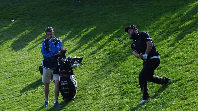 WATFORD, ENGLAND - OCTOBER 13:  Andrew Johnston of England plays his second shot on the seventh hole during the first round of the British Masters at The G