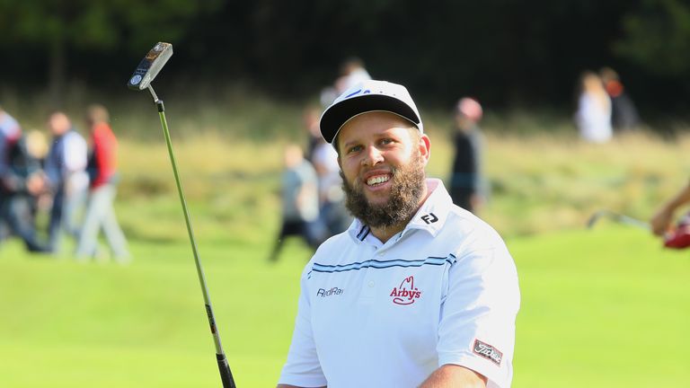 WATFORD, ENGLAND - OCTOBER 15:  Andrew Johnston of England acknowledges the crowd as he walks onto the fifth green during the third round of the British Ma