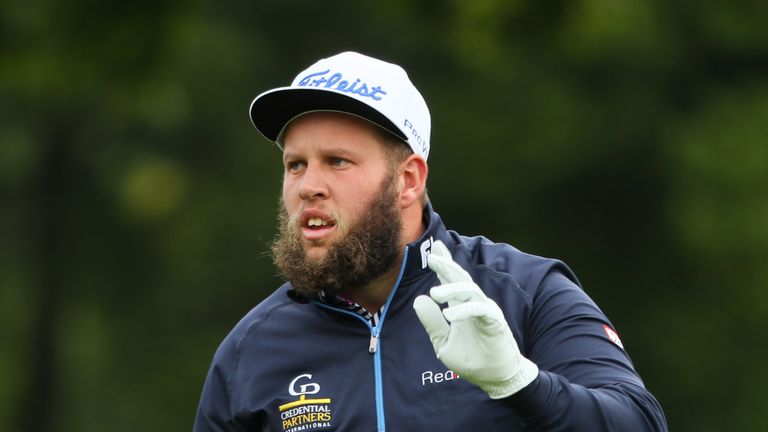 WATFORD, ENGLAND - OCTOBER 16:  Andrew Johnston of England acknowledges the crowd after playing his second shot on the first hole during the fourth round o