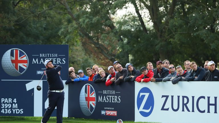 Andrew Johnston hits his tee shot on the 14th hole