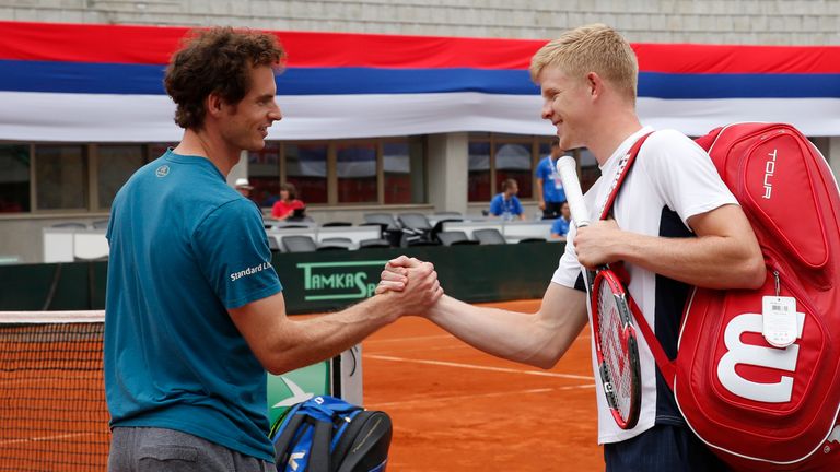 BELGRADE, SERBIA - JULY 14: Andy Murray (L) and Kyle Edmund (R) of Great Britain shake hands during their Davis Cup practice session on July 14, 2016 in Be