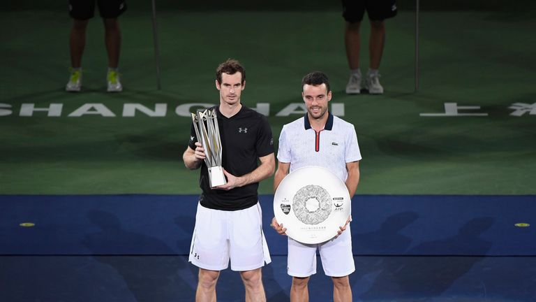 SHANGHAI, CHINA - OCTOBER 16:  Andy Murray of Great Britain and Roberto Bautista Agut of Spain pose with their trophies