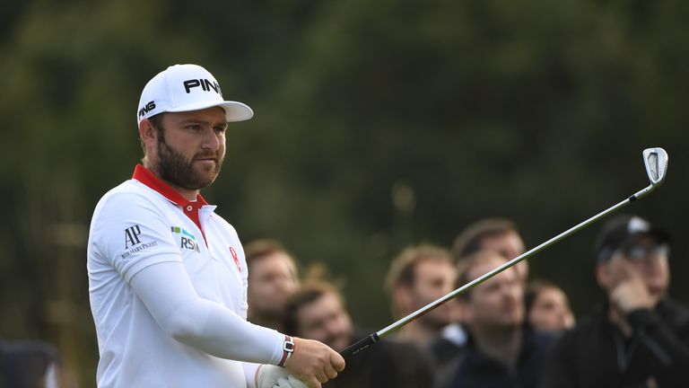 WATFORD, ENGLAND - OCTOBER 13:  Andy Sullivan of England hits his tee shot on the seventh tee during the first round of the British Masters at The Grove on