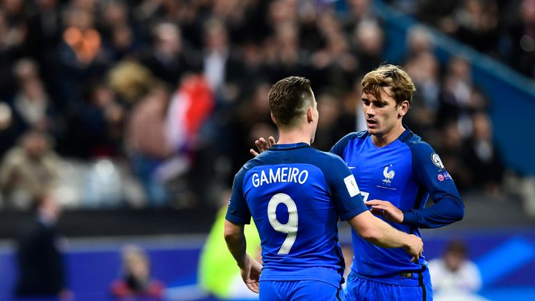 France's forward Antoine Griezmann (R) celebrates with France's forward Kevin Gameiro after scoring during the FIFA World Cup 2018 qualifying football matc
