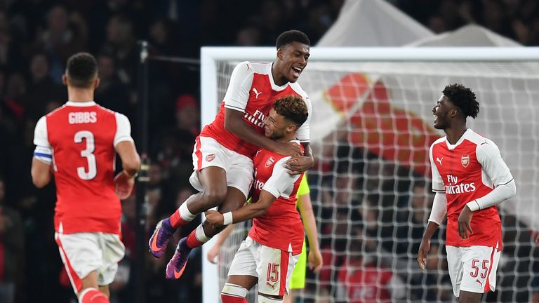 Alex Oxlade-Chamberlain of Arsenal (C) celebrates scoring his side's first goal