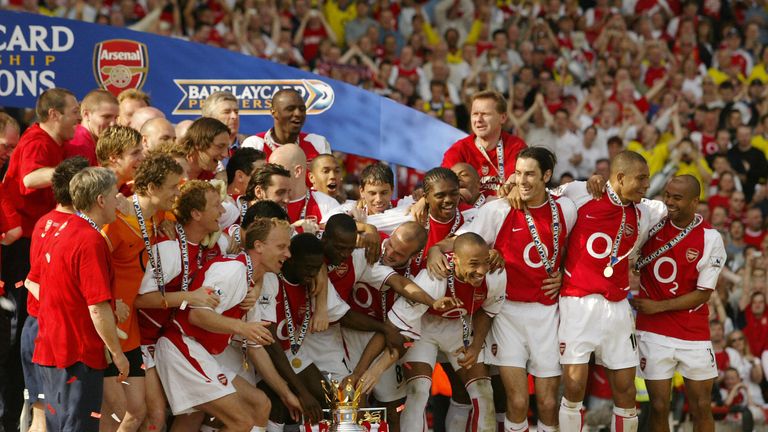 Arsenal celebrates winning the Premiership title and defeating Leicsester City 15 May, 2004 at Highbury in London. Arsenal defeate