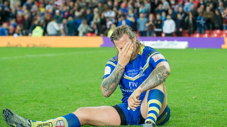 Warrington's Ashton Sims dejection shows after defeat against Wigan.