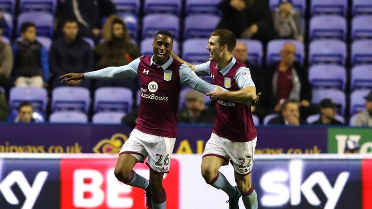 Jonathan Kodjia of Aston Villa is congratulated by team mate Gary Gardener after scoring against Reading