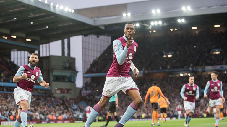 Jonathan Kodjia of Aston Villa celebrates after scoring the opening goal