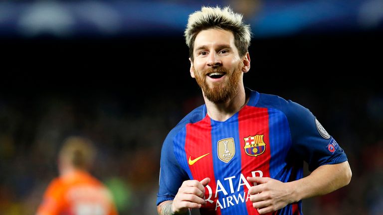 Lionel Messi celebrates after scoring his second goal against Manchester City