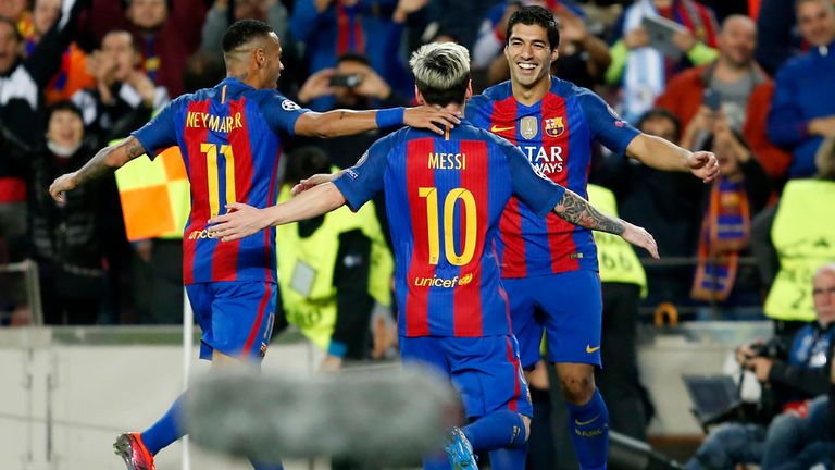 Neymar, Lionel Messi and Luis Suarez celebrate a goal during the Champions League match against Manchester City