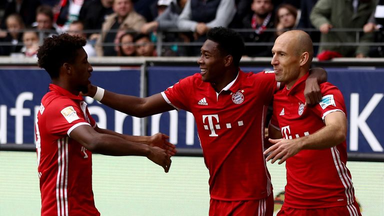 Bayern Munich players celebrate after Arjen Robben's opening goal against Frankfurt