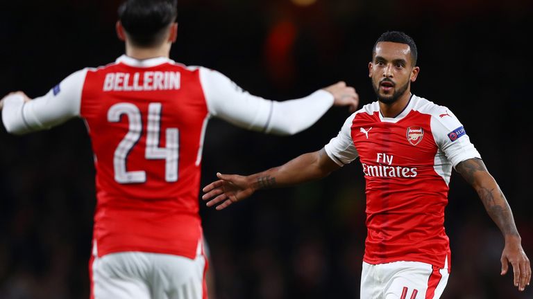 LONDON, ENGLAND - OCTOBER 19:  Theo Walcott of Arsenal celebrates with team mate Hector Bellerin during the UEFA Champions League group A match between Ars