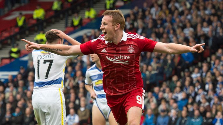 Aberdeen's Adam Rooney celebrates after opening the scoring