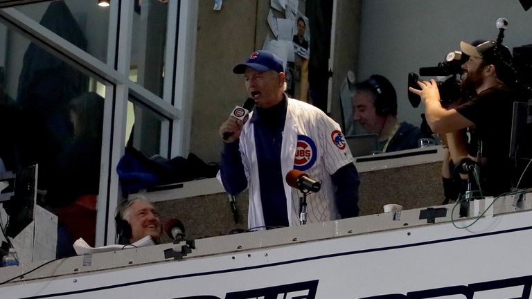 Actor Bill Murray sings "Take Me Out to the Ballgame" in the seventh inning