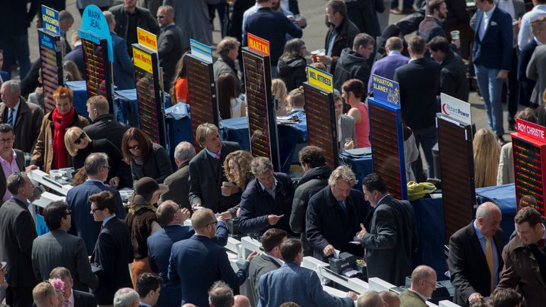 Bookmakers and racegoers before The Pearl Bloodstock Palace House Stakes Race run during QIPCO 2000 Guineas Day of the QIPCO Guineas Festival at Newmarket 