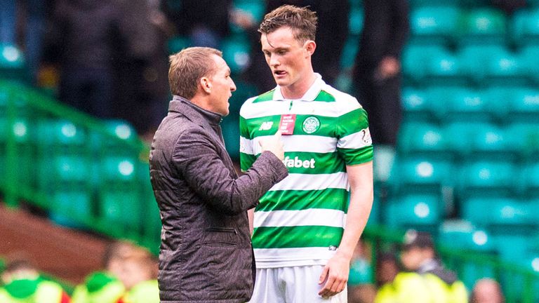 Celtic boss Brendan Rodgers has a chat with Liam Henderson after the win over Motherwell