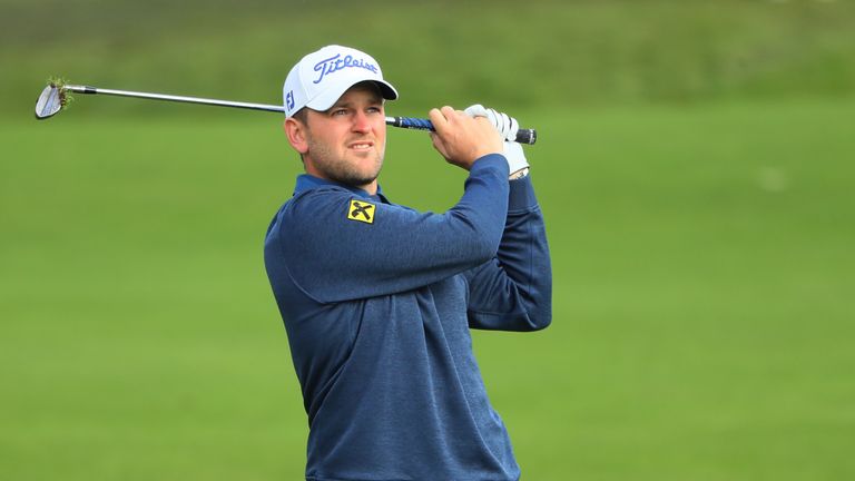 WATFORD, ENGLAND - OCTOBER 16:  Bernd Wiesberger of Austria plays his second shot on the first hole during the fourth round of the British Masters at The G