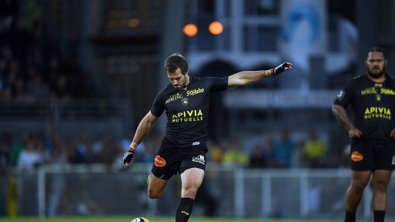 La Rochelle's fly-half Brock James kicks the ball during the French Top 14 Rugby Union match between La Rochelle and Clermont on August 20 2016