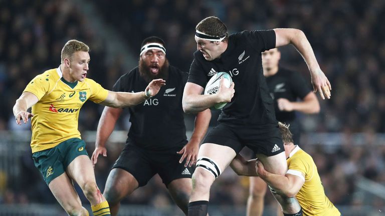 Brodie Retallick of New Zealand charges through the Australia defence