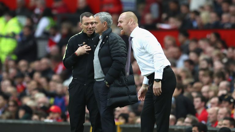 Jose Mourinho and Sean Dyche talk to the fourth official
