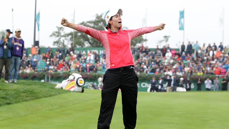 Carlota Ciganda celebrates after sinking the winning putt in South Korea