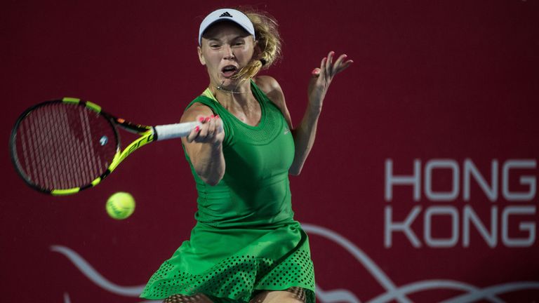 Denmark's Caroline Wozniacki hits a return against China's Wang Qiang during their women's singles quarter-final match at the Hong Kong Open tennis tournam