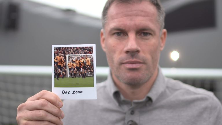 Jamie Carragher holds December 2000 photo