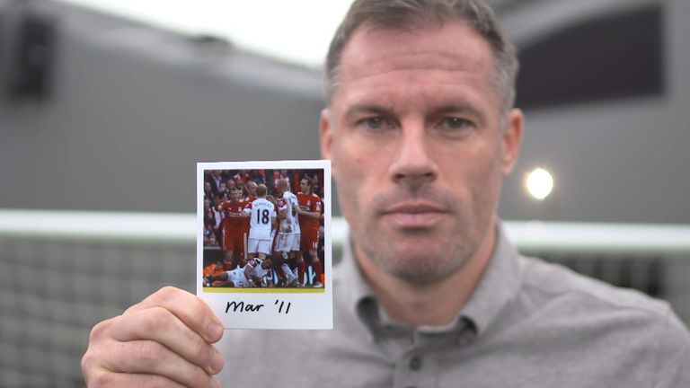 Jamie Carragher holds March 2011 picture