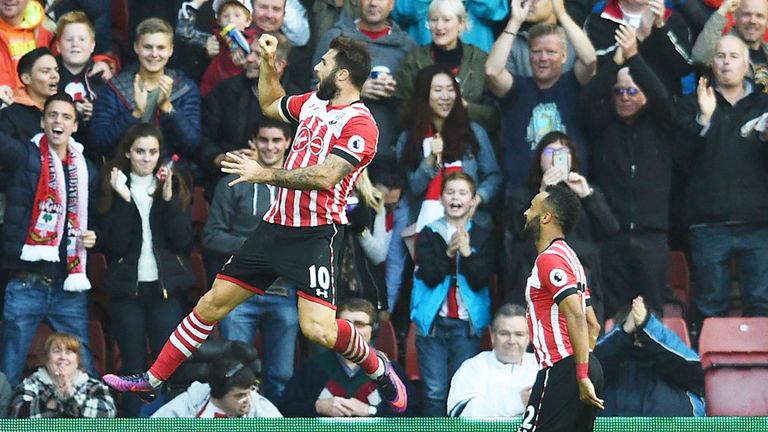 Charlie Austin (left) celebrates a goal against Burnley
