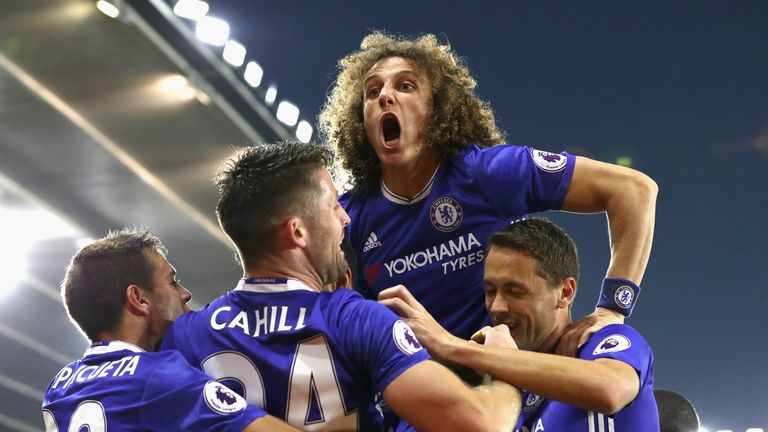 SOUTHAMPTON, ENGLAND - OCTOBER 30: David Luiz of Chelsea (C) celebrates after his team mate Diego Costa of Chelsea scores their sides second goal during th