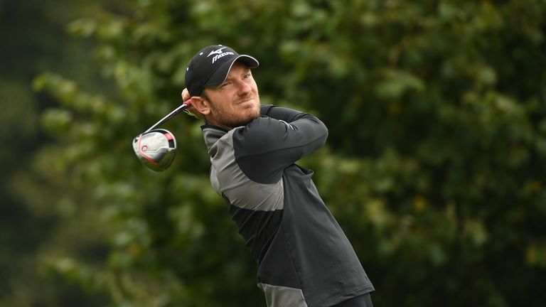 WATFORD, ENGLAND - OCTOBER 15:  Chris Wood of England hits his tee shot on the third hole during the third round of the British Masters at The Grove on Oct