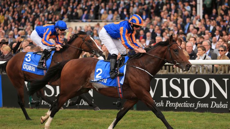 Churchill (front) ridden by Ryan Moore goes onto win the Dubai Dewhurst Stakes at Newmarket
